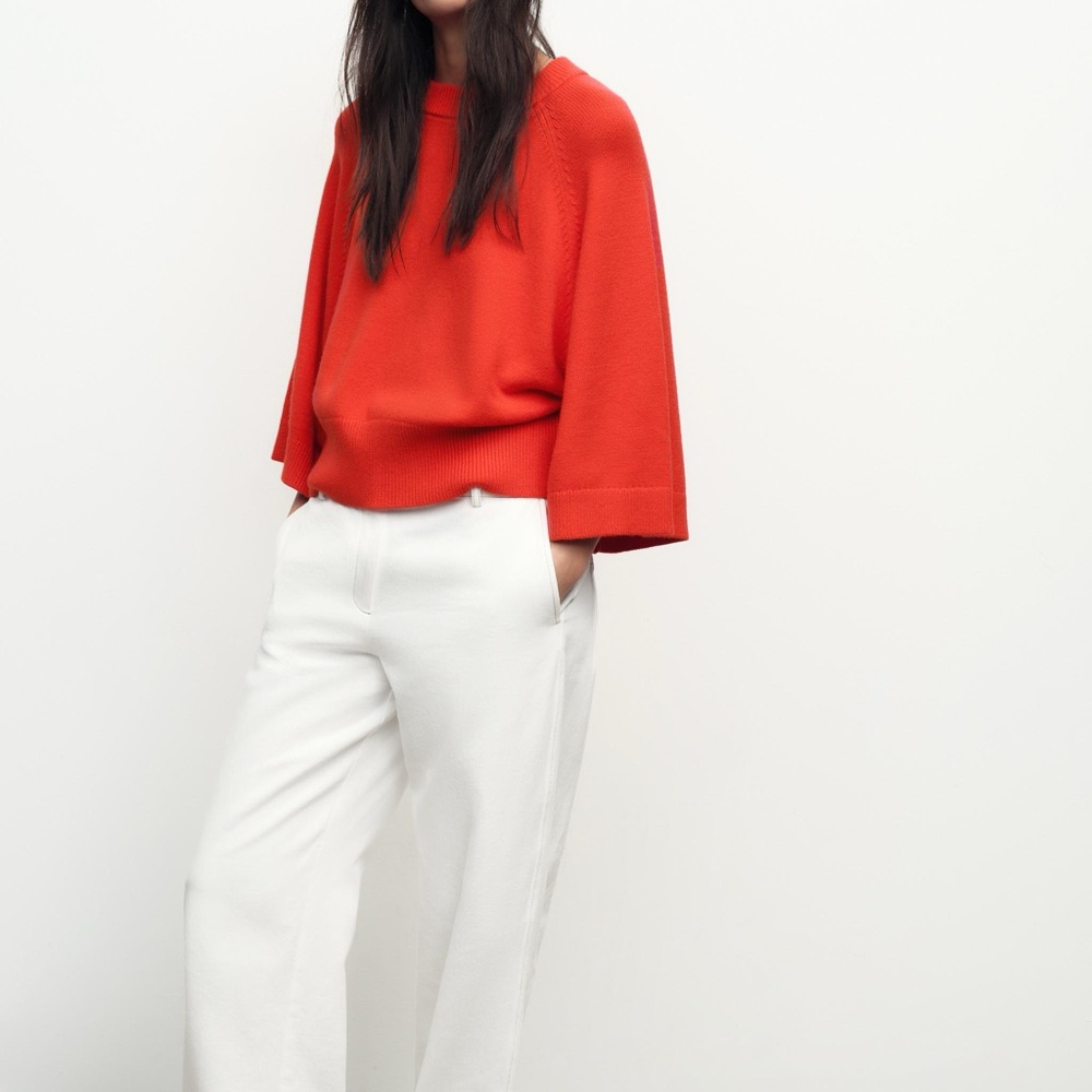 Vibrant Red Sweater with White Pants
